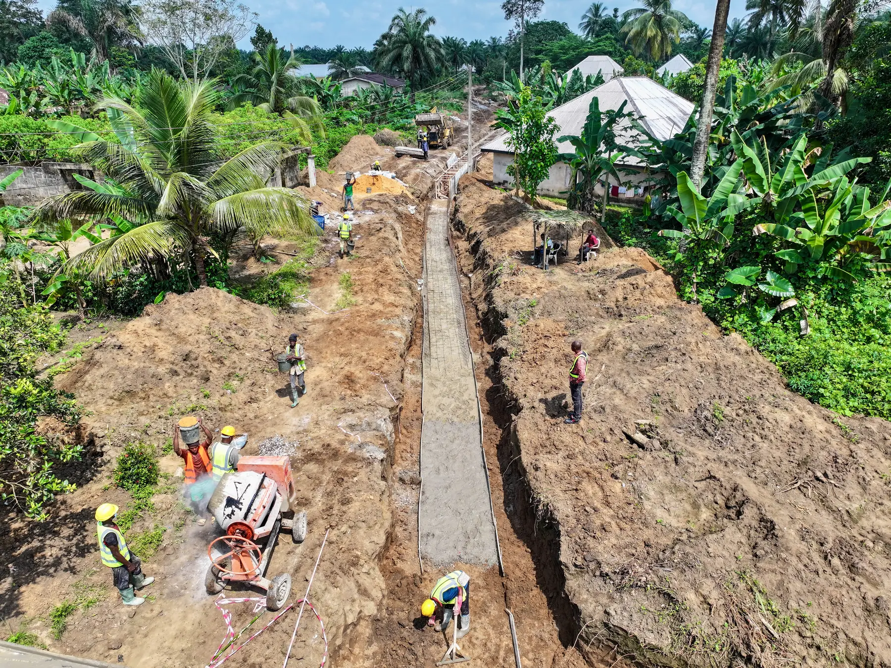 Concrete roadside drainage channel under construction