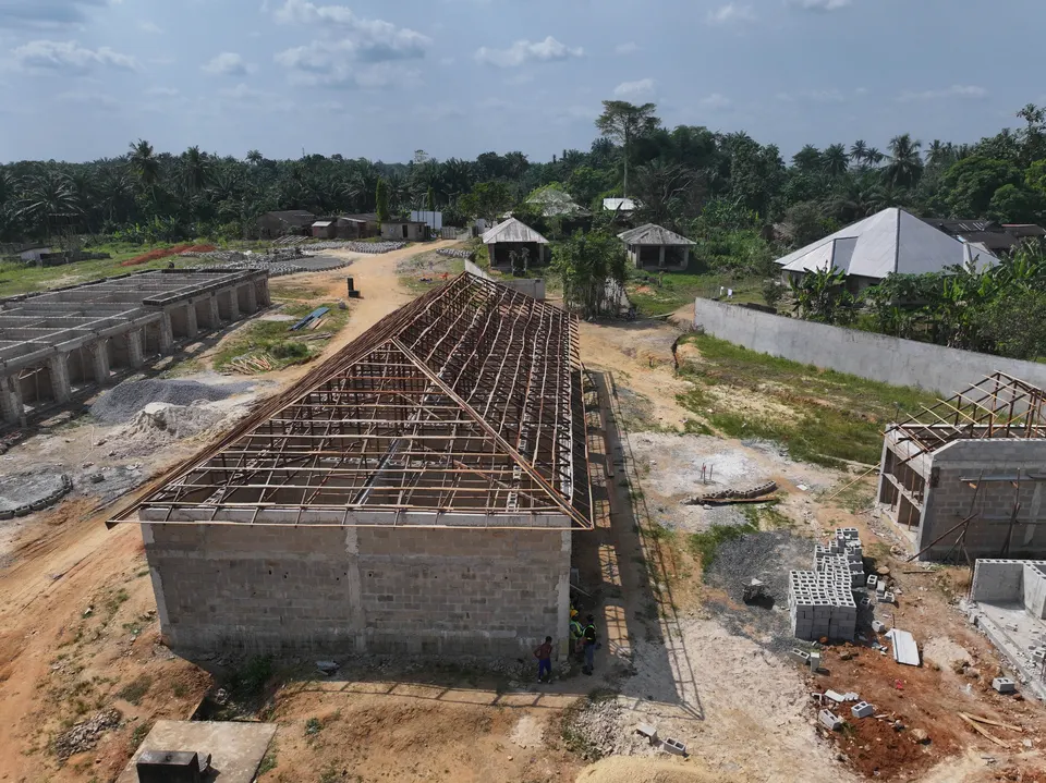 Aerial view of steel roof framing across several market structures