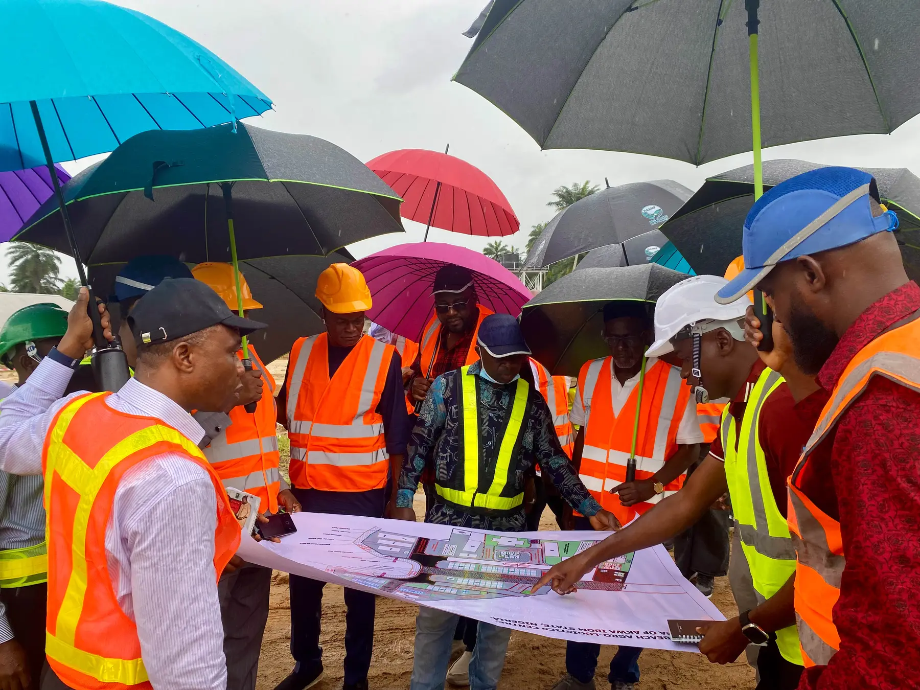 Construction team reviewing project plans during a site briefing